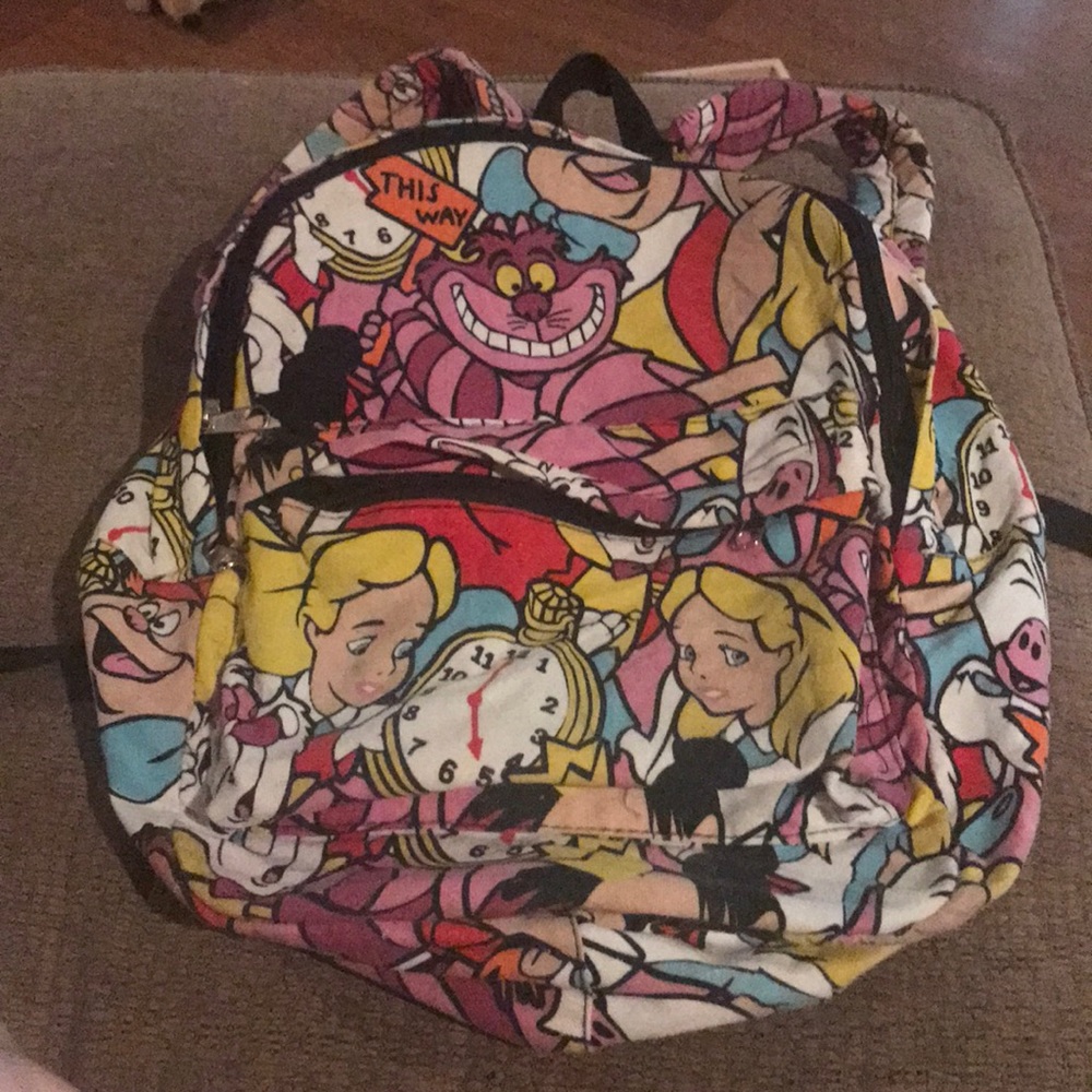 Used Alice In Wonderland backpack!